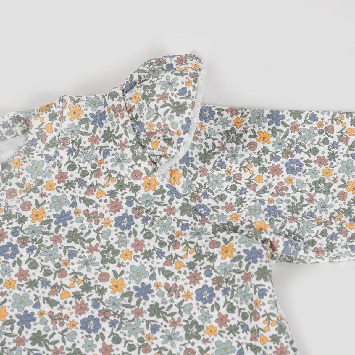 Camiseta Anti-UV Flowers T/S (9-12 m) - Imagen 3